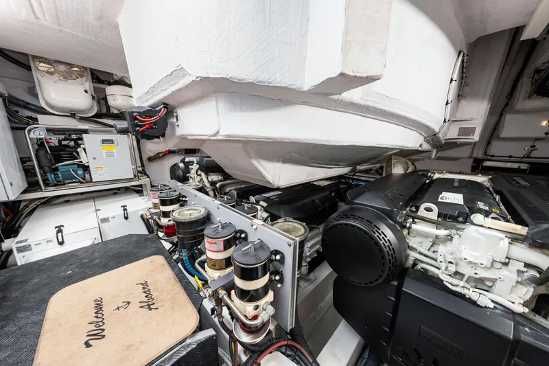 Slide: The Image of Engine room of a 2020 Azimut S6 yacht, showcasing mechanical components and systems. - 118