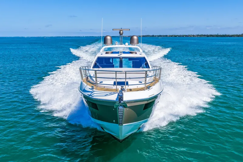 Slide: The Image of 2020 Azimut S6 yacht cruising on open blue water. - 56