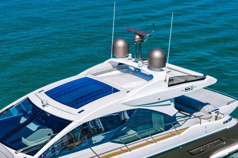 Slide: The Image of 2020 Azimut S6 yacht on blue water, showcasing sleek design and modern features. - 12