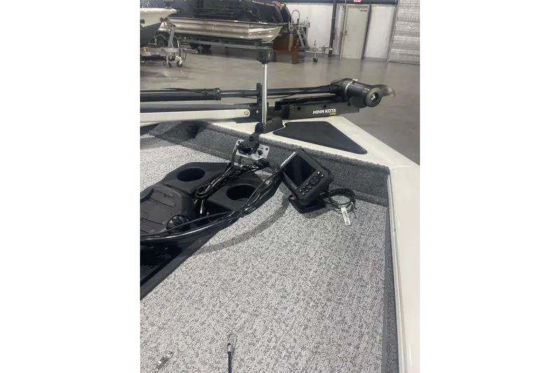 Slide: The Image of 2024 Tracker Pro Team 175 TXW boat with Minn Kota trolling motor and fishfinder. - 37
