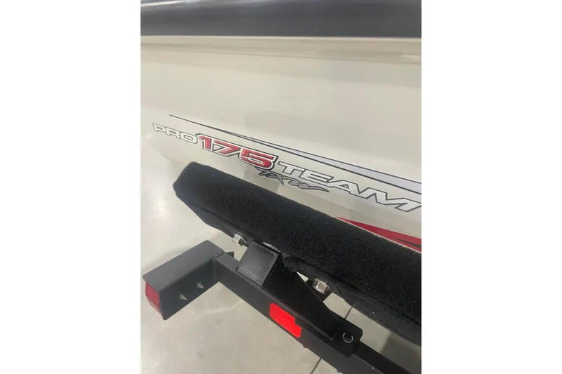 Slide: The Image of 2024 Tracker Pro Team 175 TXW boat detail with logo and trailer. - 45