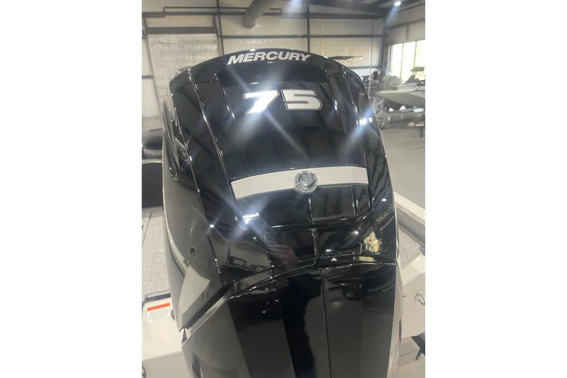 Slide: The Image of 2024 Tracker Pro Team 175 TXW with Mercury 75 engine in showroom. - 46