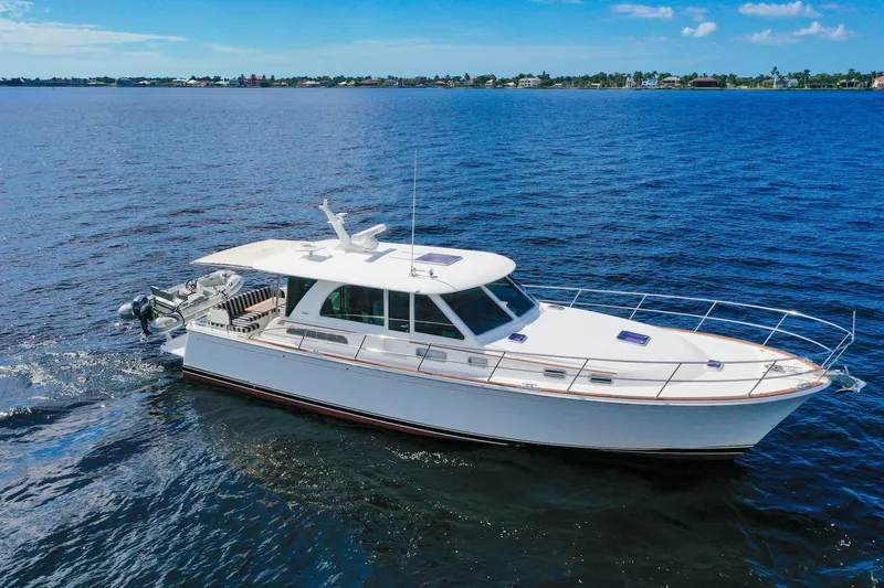 Slide: The Image of 2019 Sabre 45 Salon Express yacht cruising on open water. - 81