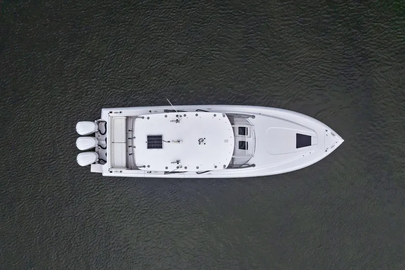 Slide: The Image of Aerial view of 2011 Intrepid 370 Cuddy boat on water. - 6