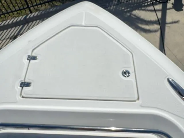 Slide: The Image of 2016 Boston Whaler 350 Outrage boat deck with storage compartment. - 24