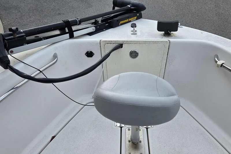 Slide: The Image of 2011 Cobia 194 Center Console boat with a mounted Minn Kota trolling motor. - 6