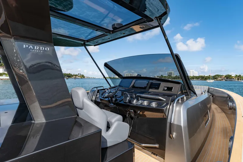 Slide: The Image of Cockpit of Pardo Yachts 43, 2023 model, on open water. - 12