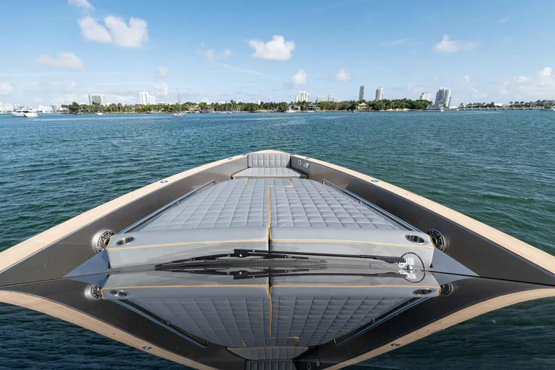 Slide: The Image of Pardo Yachts 43, 2023 model, on open water with city skyline. - 18