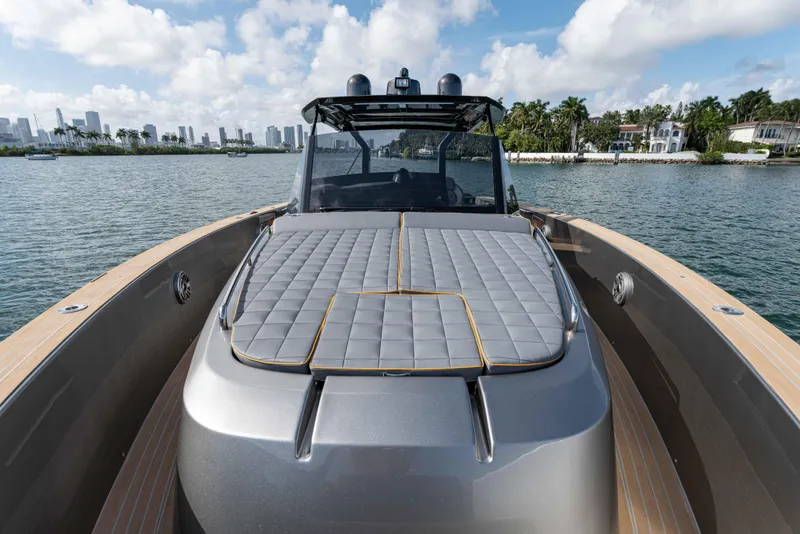 Slide: The Image of Pardo Yachts 43, 2023, on calm waters with city skyline backdrop. - 19