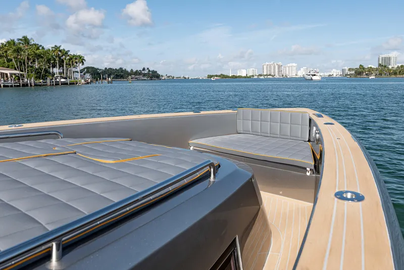 Slide: The Image of Pardo Yachts 43, 2023, luxury deck with seating area on calm waters. - 20
