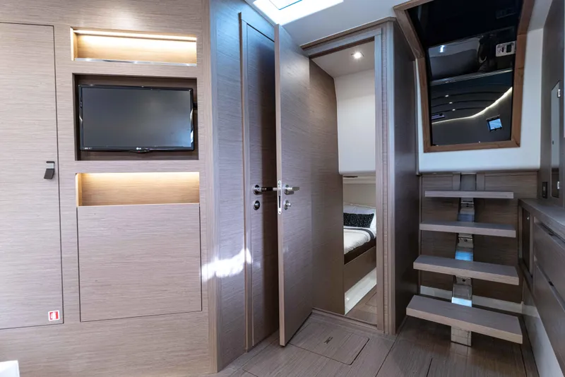 Slide: The Image of Interior of 2023 Pardo Yachts 43, featuring modern design and wood finishes. - 26