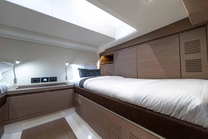Slide: The Image of Interior of Pardo Yachts 43, 2023, featuring modern beds and lighting. - 29