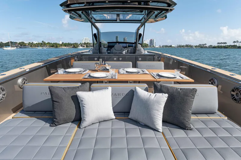 Slide: The Image of Luxurious Pardo Yachts 43 deck with dining setup, 2023 model. - 7
