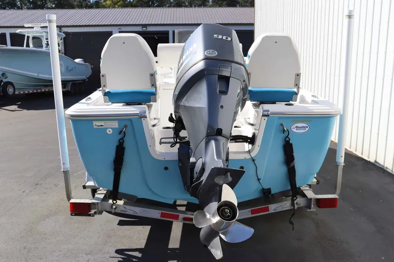 Slide: The Image of 2015 Sportsman 17 Island Reef boat with outboard motor. - 4