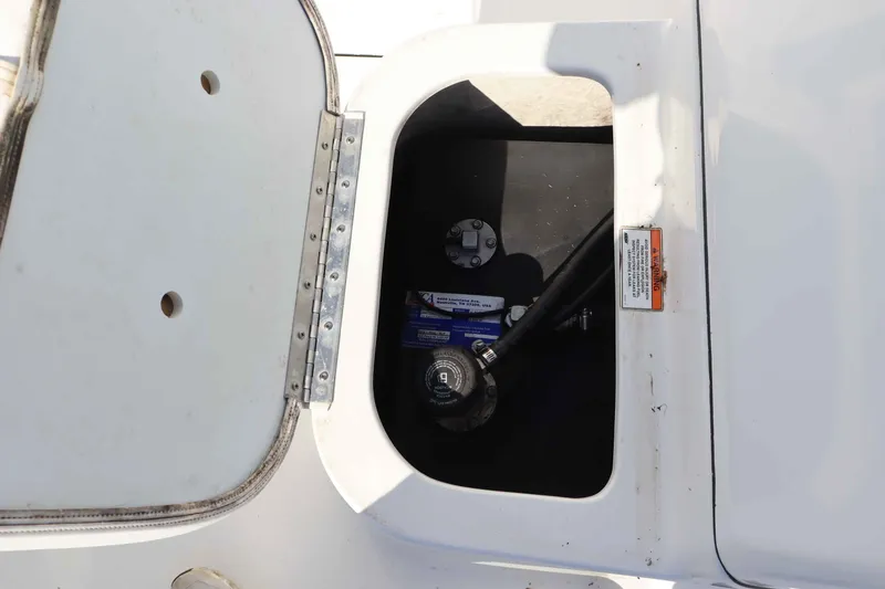 Slide: The Image of Open storage compartment of a 2015 Sportsman 17 Island Reef boat. - 8