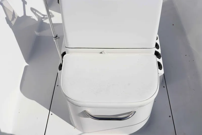 Slide: The Image of Sportsman 17 Island Reef 2015 boat seat with storage compartment. - 9