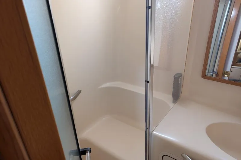 Slide: The Image of Bathroom shower area in 2000 Sea Ray 420 Aft Cabin yacht. - 13