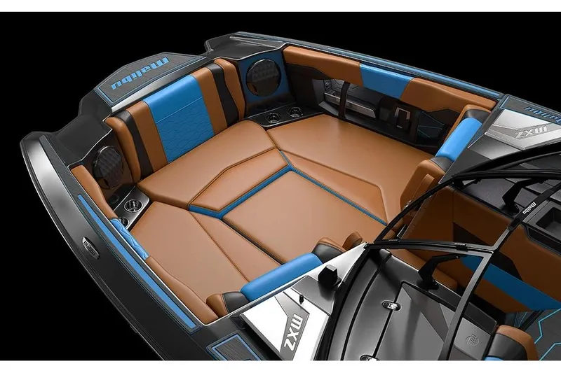 Slide: The Image of Manufacturer Provided Image: 2026 Malibu Wakesetter 24 MXZ interior with brown and blue seating, luxury boat design. - 12