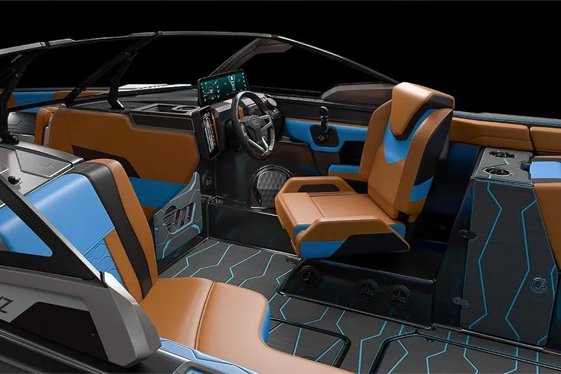 Slide: The Image of Manufacturer Provided Image: 2026 Malibu Wakesetter 24 MXZ interior with modern design, featuring brown and blue seating. - 13
