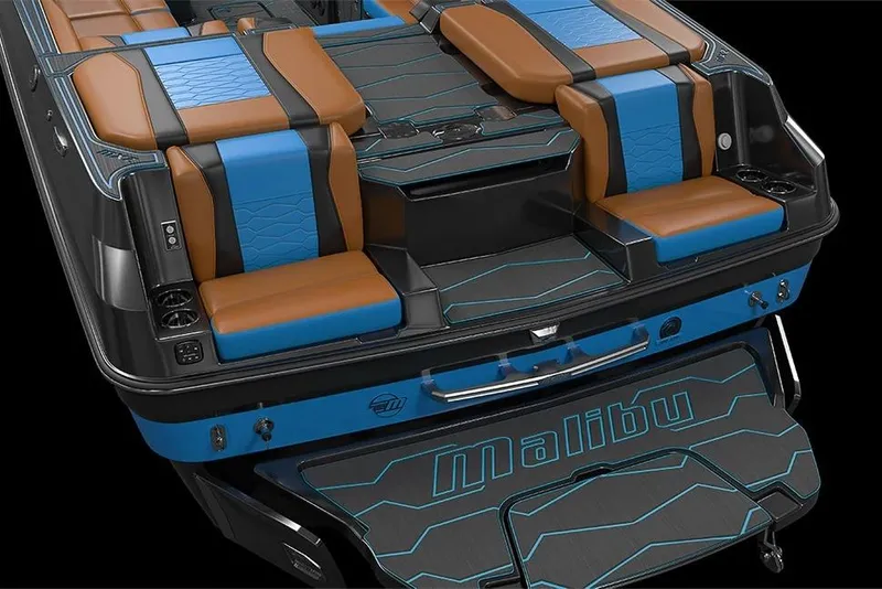 Slide: The Image of Manufacturer Provided Image: 2026 Malibu Wakesetter 24 MXZ boat interior with blue and brown seating, sleek design. - 16