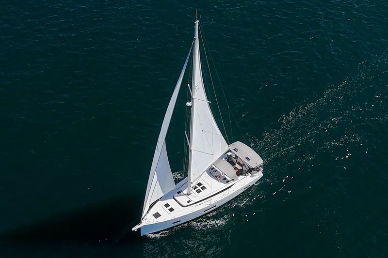 Slide: The Image of 2023 Bavaria C50 sailing yacht gliding on open sea waters. - 11