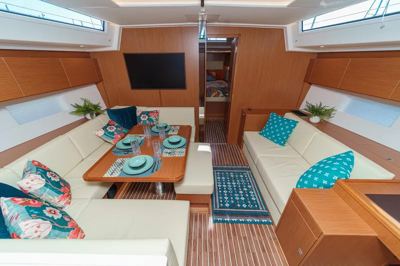 Slide: The Image of Luxurious interior of 2023 Bavaria C50 yacht with elegant seating and dining area. - 29