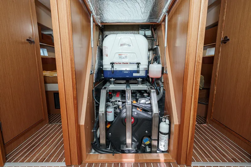 Slide: The Image of Engine room of 2023 Bavaria C50 yacht with Fischer Panda generator. - 60