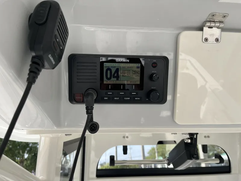 Slide: The Image of Garmin radio in Cobia 285 Open Center Console 2026. - 15