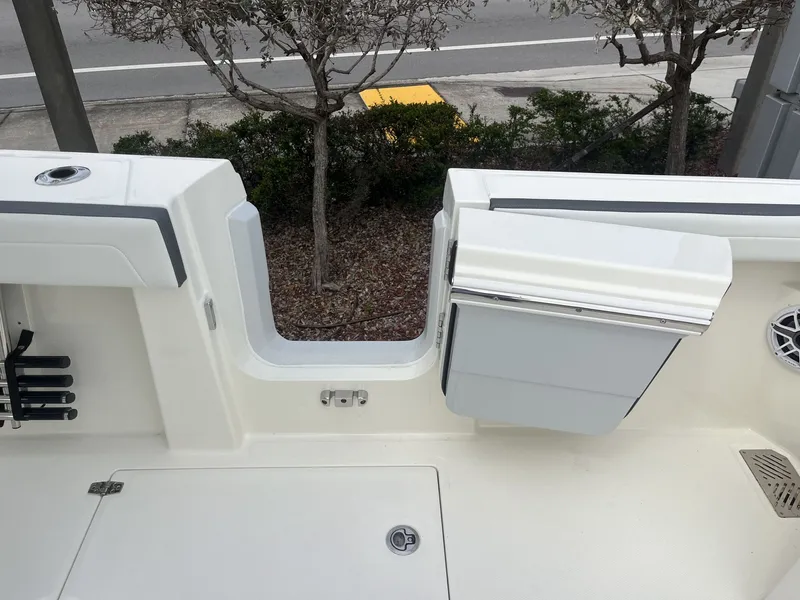 Slide: The Image of Cobia 285 Open Center Console 2026 with open door. - 34