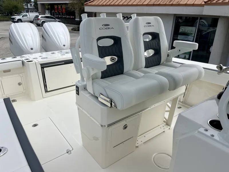 Slide: The Image of 2026 Cobia 285 Open Center Console with luxurious seating. - 27