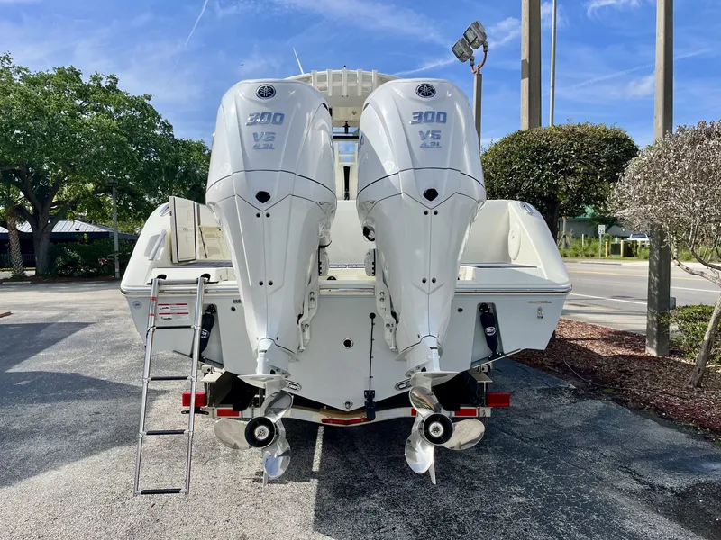 Slide: The Image of 2026 Cobia 285 Open Center Console with twin Yamaha engines. - 5