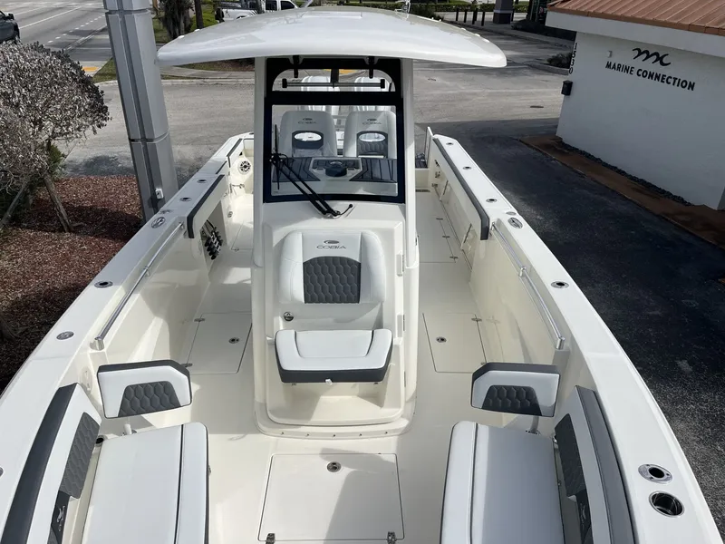 Slide: The Image of 2026 Cobia 285 Open Center Console boat on display. - 24