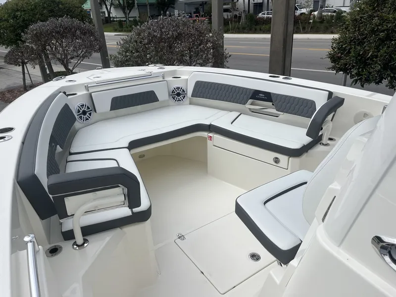 Slide: The Image of Cobia 285 Open Center Console 2026 with luxurious seating area. - 26