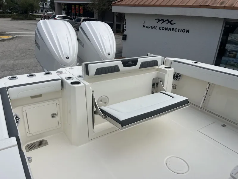 Slide: The Image of Cobia 285 Open Center Console 2026 with foldable seat and Yamaha engines. - 32