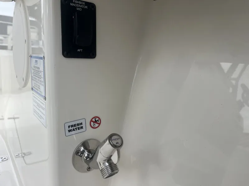 Slide: The Image of Fresh water connection on Cobia 285 Open Center Console 2026. - 36