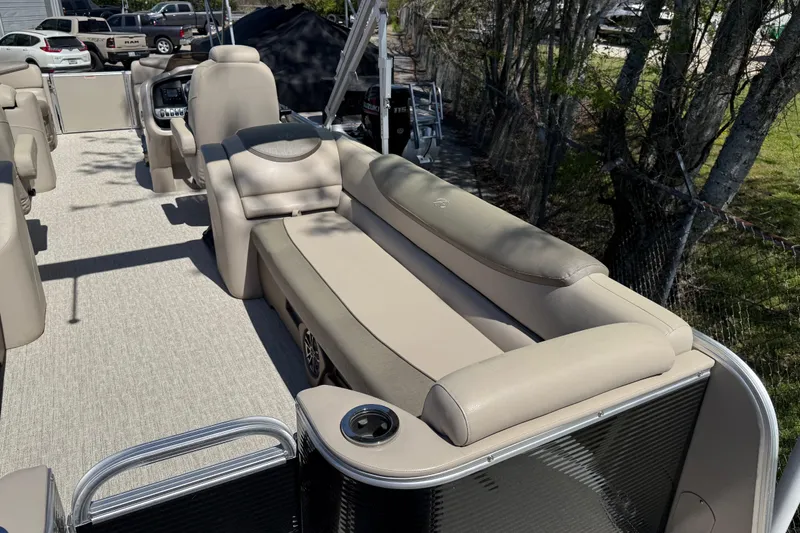 Slide: The Image of 2020 Avalon Catalina Quad Lounge 25' with beige seating and spacious deck. - 12