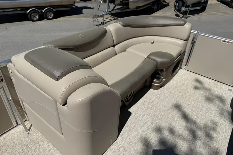 Slide: The Image of 2020 Avalon Catalina Quad Lounge 25' boat interior with plush seating. - 20