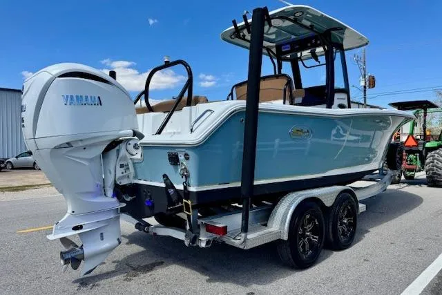 Slide: The Image of 2022 Sea Hunt Ultra 255 SE boat on trailer with Yamaha outboard motor. - 4