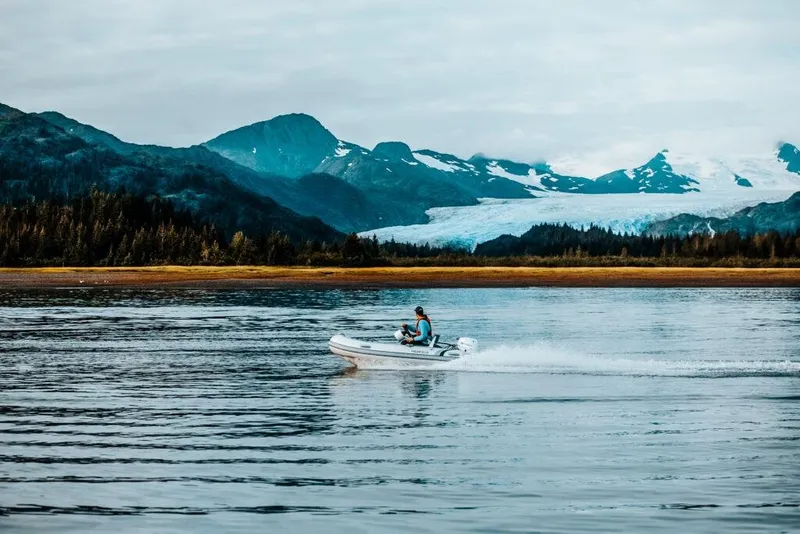 Slide: The Image of Highfield Classic 340 boat on water with mountain backdrop, 2026. - 15