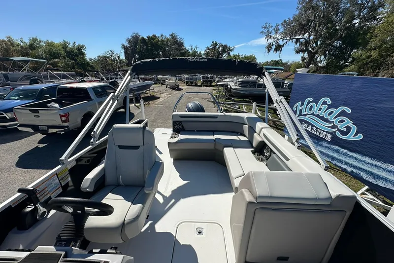 Slide: The Image of 2026 Sweetwater FD2260RE3 pontoon boat at Holiday Marine dealership. - 10