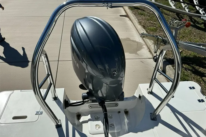 Slide: The Image of 2026 Sweetwater FD2260RE3 boat with Yamaha outboard motor on trailer. - 25