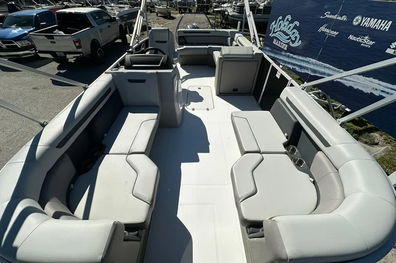 Slide: The Image of Spacious interior of 2026 Sweetwater FD2260RE3 pontoon boat with comfortable seating. - 5