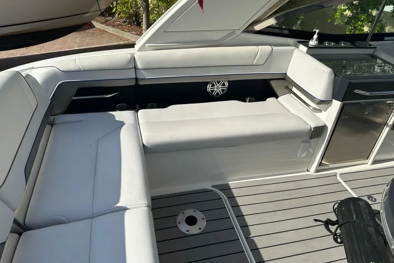 Slide: The Image of 2021 Formula 330 Crossover Bowrider OB interior with sleek seating and modern amenities. - 19