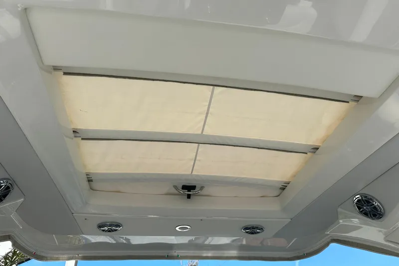 Slide: The Image of 2021 Formula 330 Crossover Bowrider OB sunroof and speakers detail. - 20