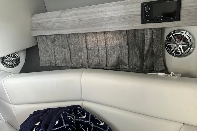 Slide: The Image of Interior of 2021 Formula 330 Crossover Bowrider OB with speakers and cozy seating. - 36