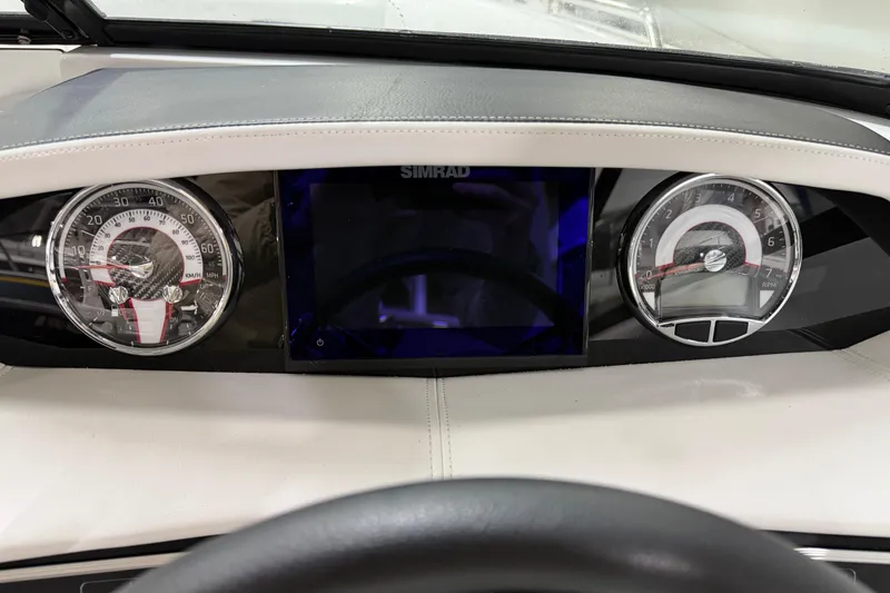 Slide: The Image of 2024 Four Winns HD5 dashboard with speedometer, tachometer, and digital display. - 45
