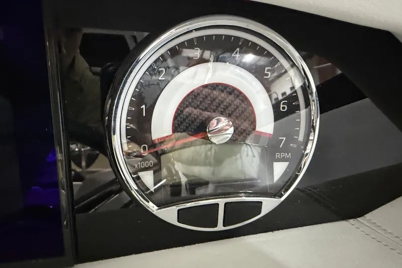 Slide: The Image of Tachometer of 2024 Four Winns HD5 boat, displaying RPM gauge. - 47