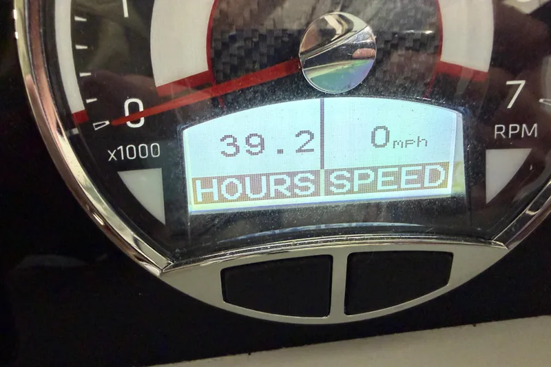 Slide: The Image of Dashboard display of a 2024 Four Winns HD5 showing 39.2 hours and 0 mph. - 49