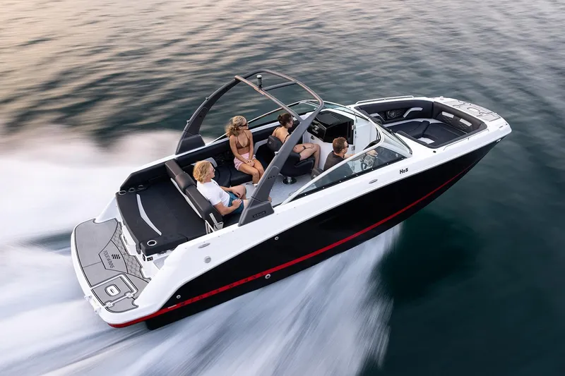 Slide: The Image of Manufacturer Provided Image: 2024 Four Winns HD5 boat cruising with passengers on a lake. - 7