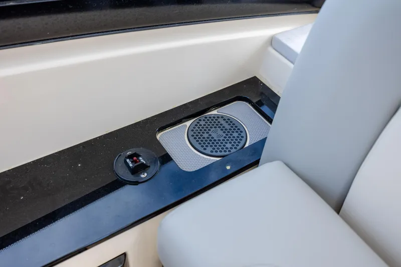 Slide: The Image of 2023 Scout 277 Dorado boat interior with speaker and control panel detail. - 27